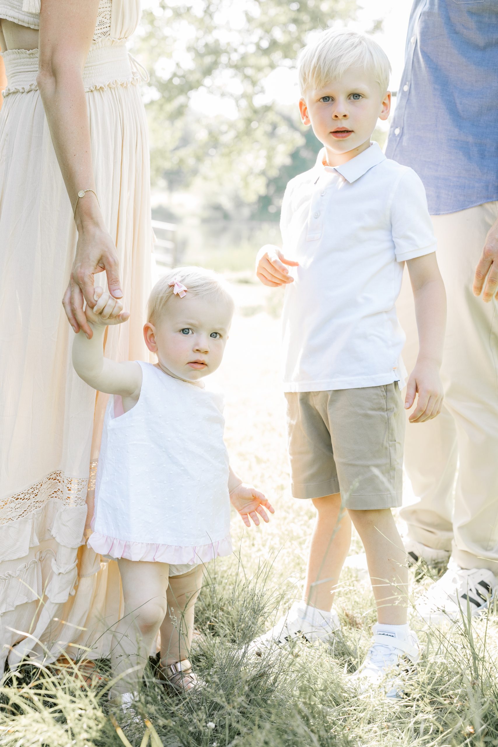 Brother and sister standing together dressed in neutrals by NJ Newborn Photographer